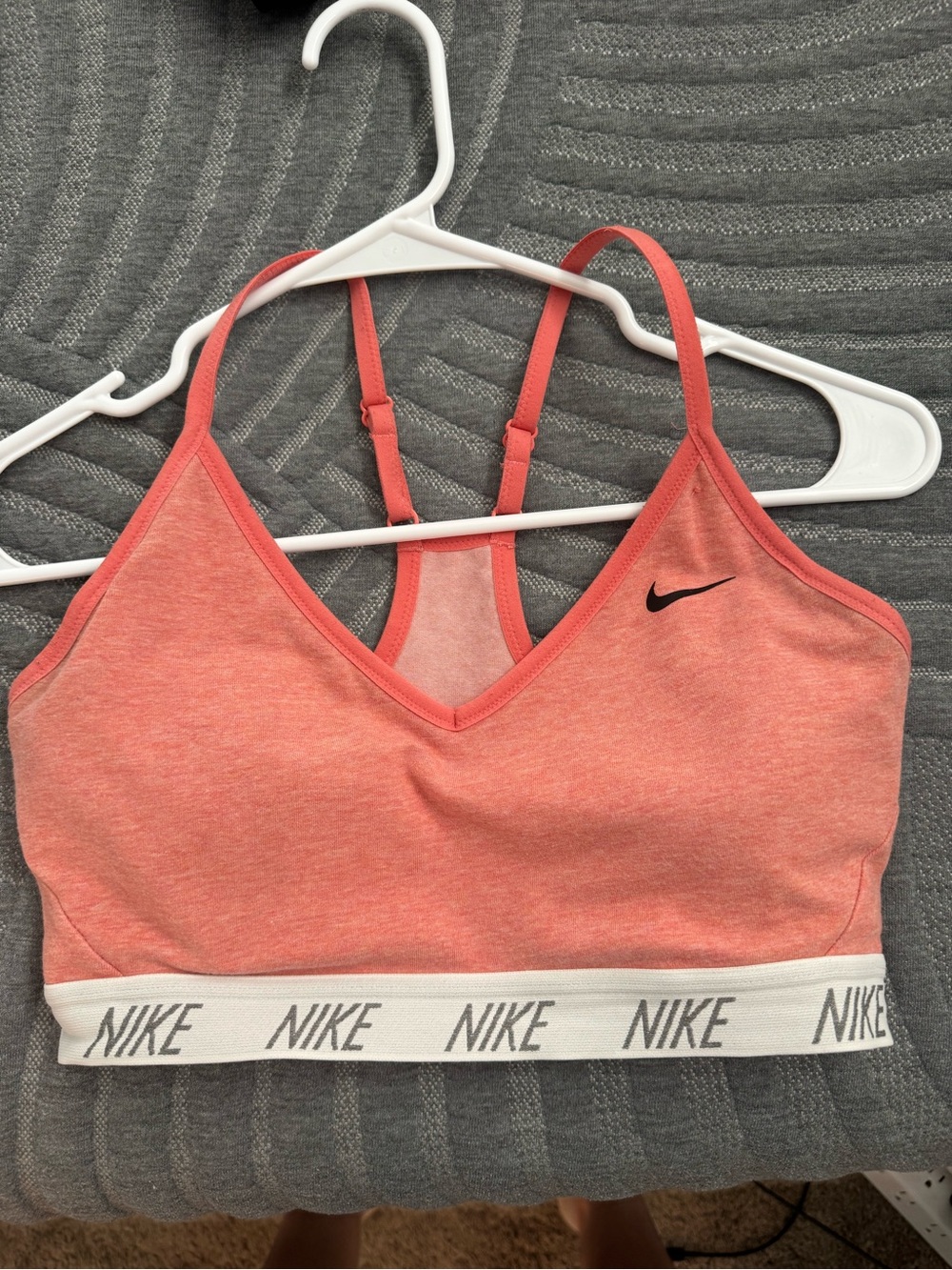 Nike Coral Pink V‑Neck Sports Bra with Logo Elastic Band